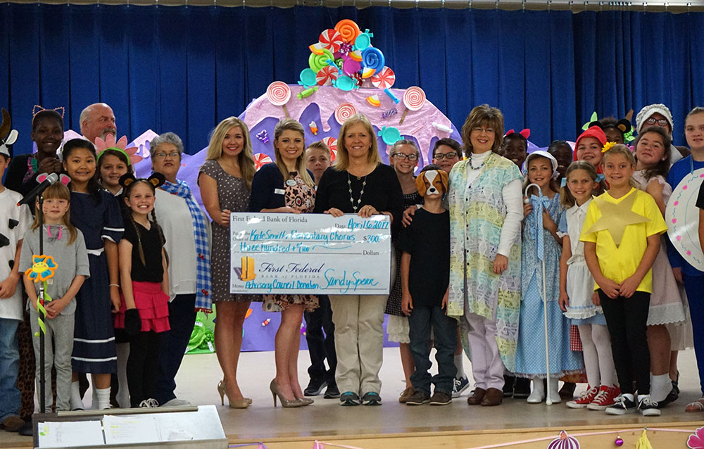 The Kate Smith Elementary Chorus stands on stage after their presentation.