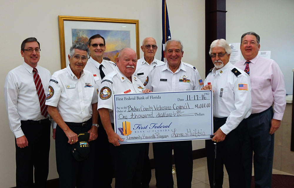 Members of the Baker County Veterans Council stand with their check from First Federal's Community Rewards Program.