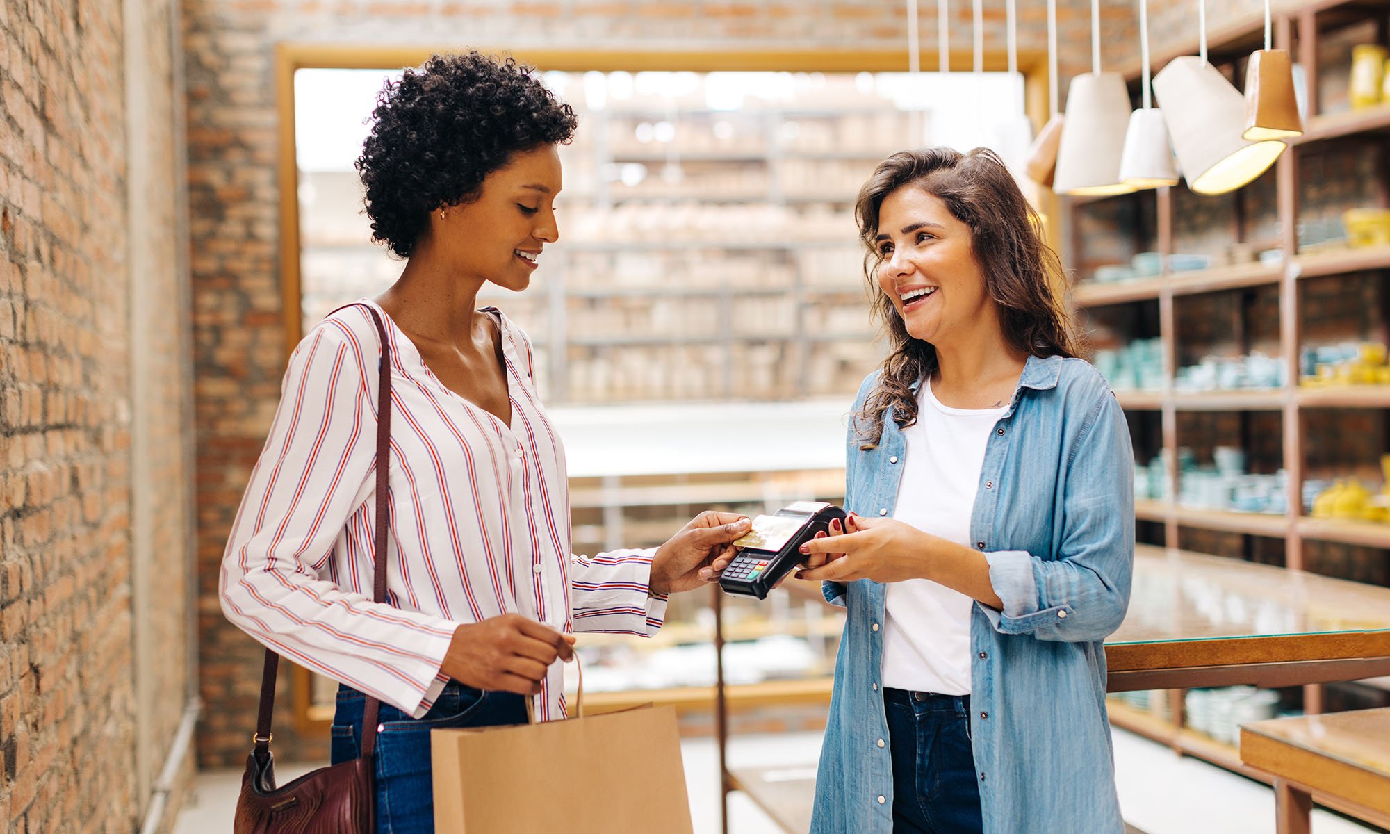woman using tap feature to pay for checkout