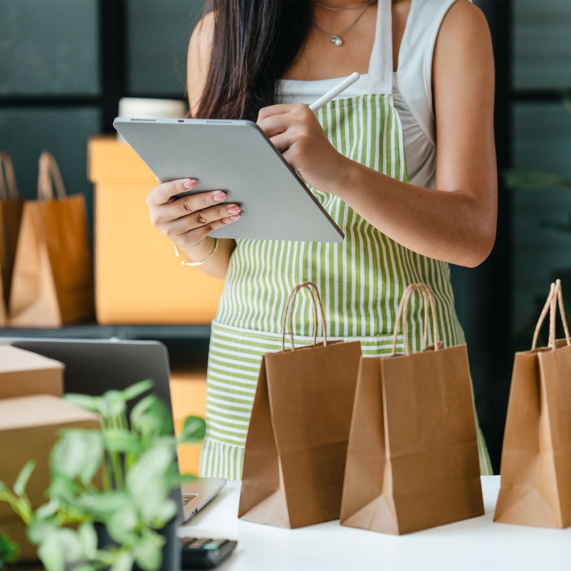 business woman doing reporting on tablet